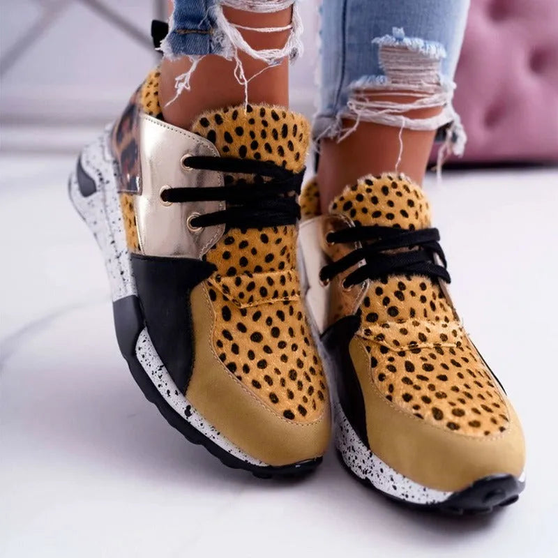 Women's suede casual sneakers with a wedge heel in leopard print colour.