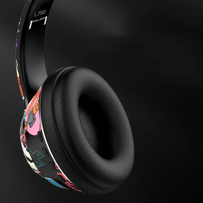 Graffiti wireless Bluetooth headset in black on a plain background with over-ear design