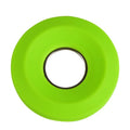 Donut silicone suction cup cord reel in green with earphone cable wound around it and magnet ring closed