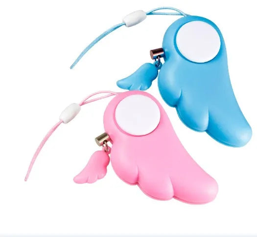 Blue personal security alarm with clip and pull pin on a grey handbag strap
