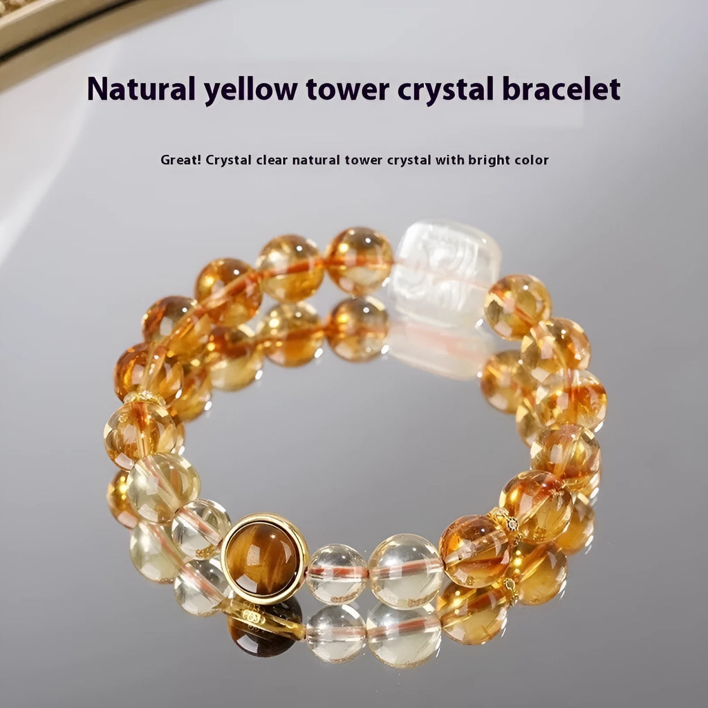 Women's ethnic style carved citrine crystal bracelet with geometric 10mm beads on a white background