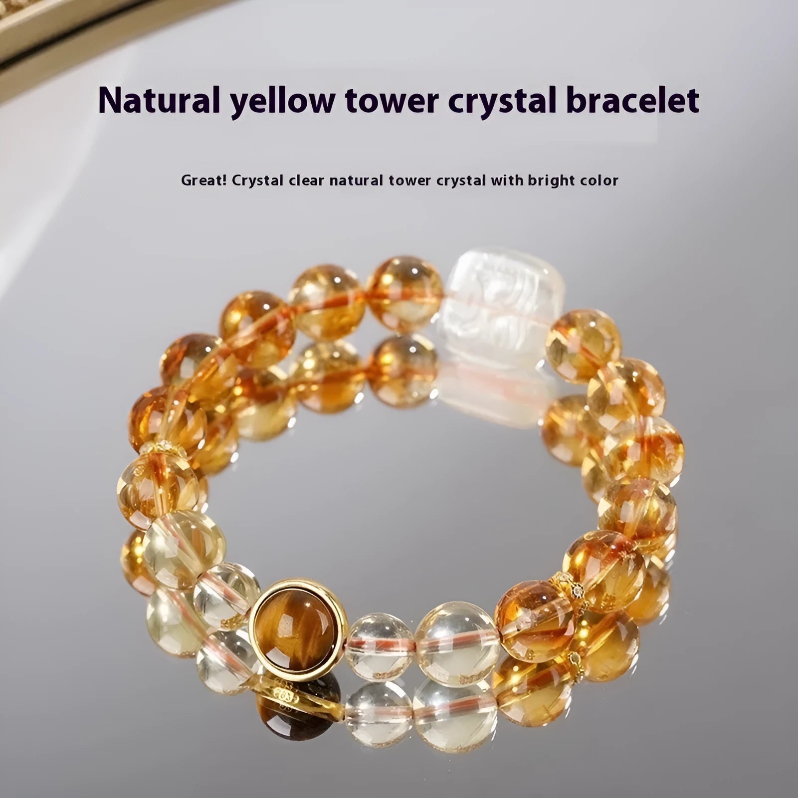 Women's ethnic style carved citrine crystal bracelet with geometric 10mm beads on a white background