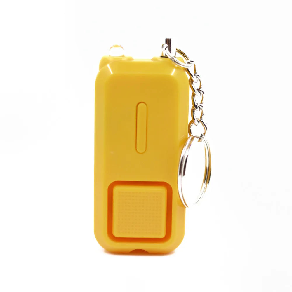 ZQ-202 personal safety alarm in pink, showing compact size and keychain attachment.