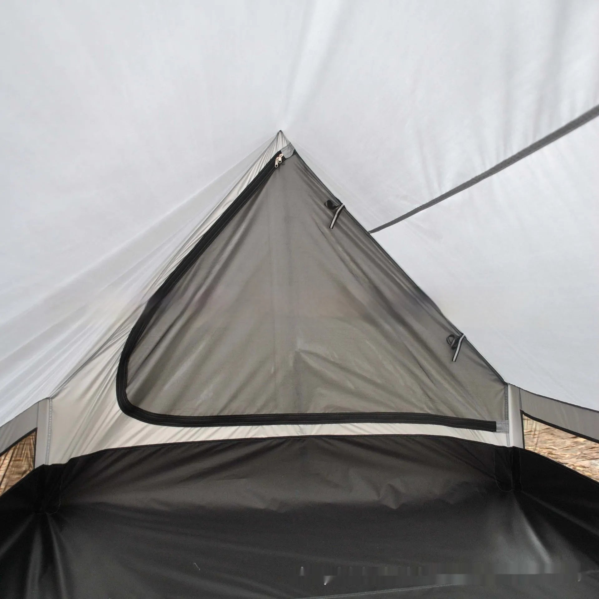 Brown or white A-line pole-free tent pitched with hiking canes showing 210x150x110cm dimensions