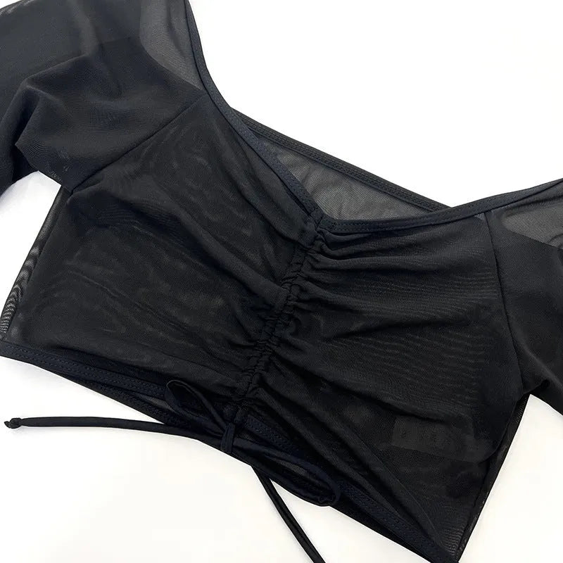 Black mesh four-piece bikini set with long sleeves for women swimming