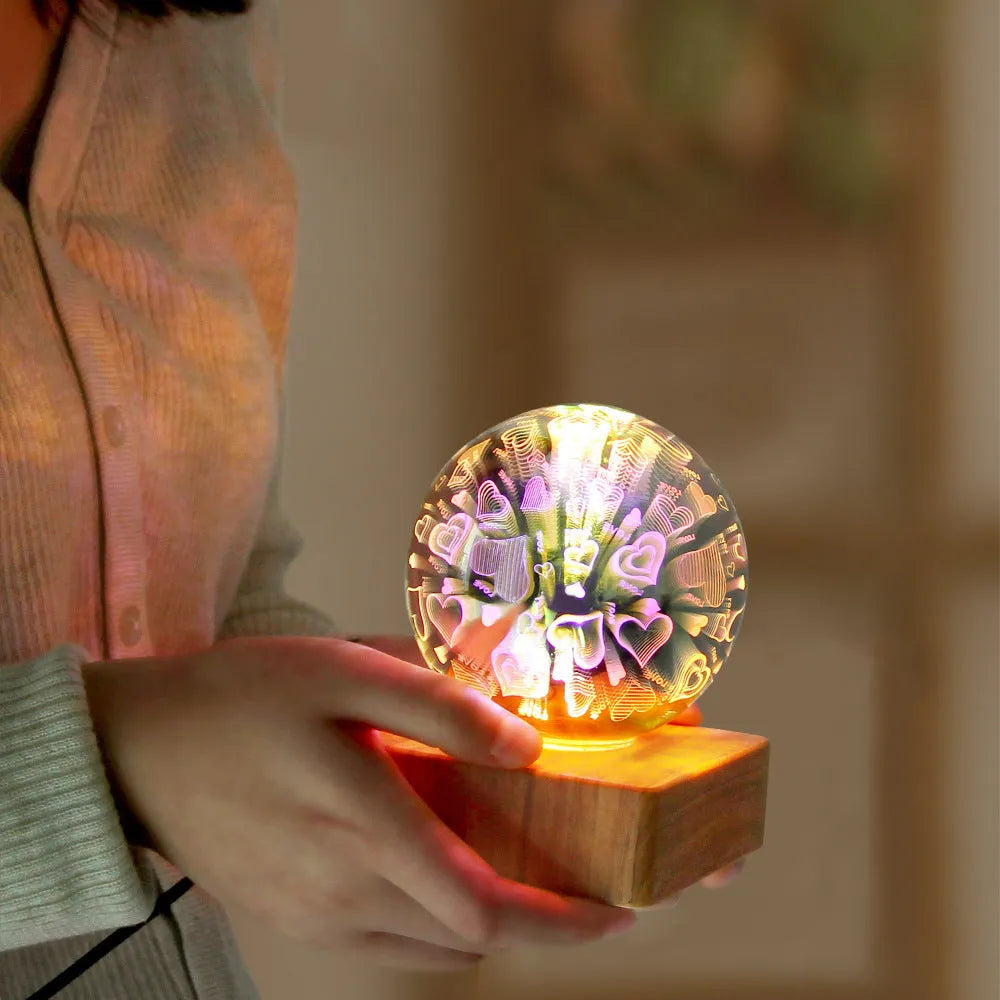 USB 3D firework crystal ball night light with warm LED, touch control, and starry sky effect on a wooden desk