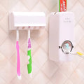 White and wine red plastic silicone toothbrush holder set with suction mount on a bathroom tile wall