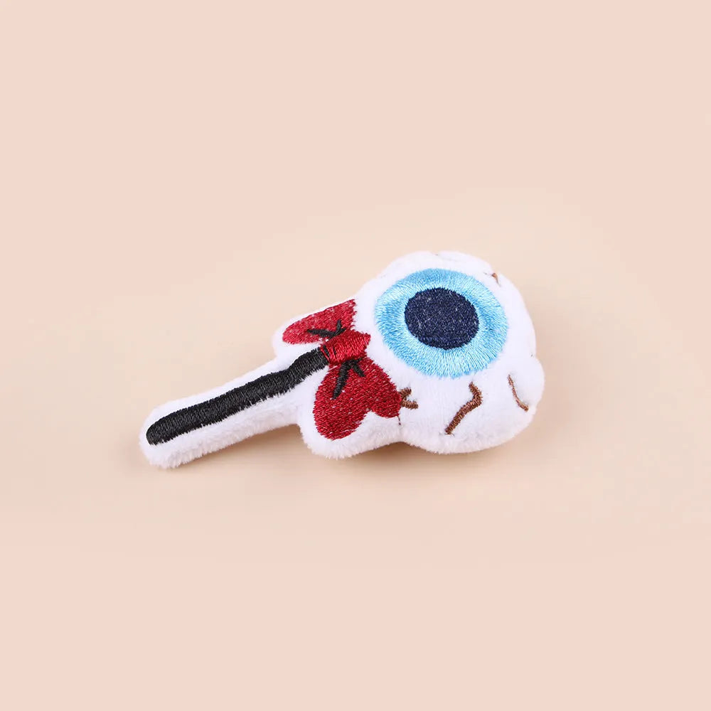 Small plush cat teaser toy with wand and colourful attachments for feline play