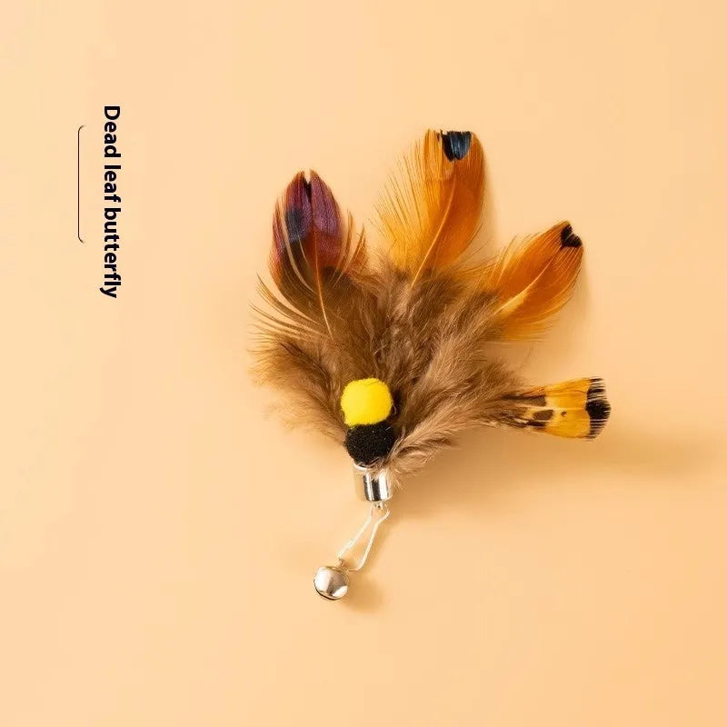 Three steel wire cat toy replacement heads with small flying insect designs in varied colours