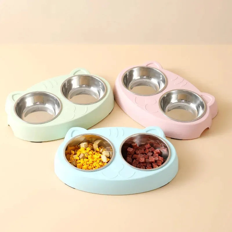 Blue plastic pet feeding tray with two built-in bowls for cat or dog food and water.