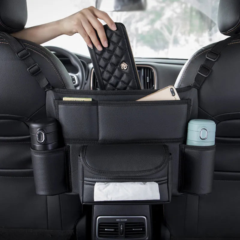 Black leather interseat storage bag for tissues hanging between car front seats, 38x24x15cm