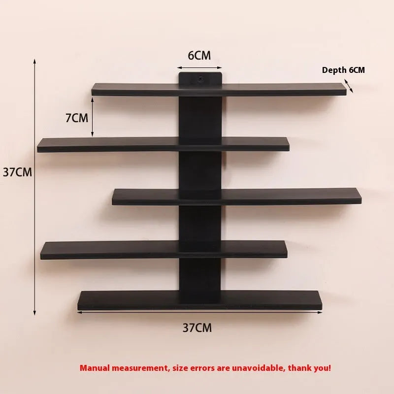 5-tier wall-mounted PVC storage rack for dolls and blind box toys in a home setting