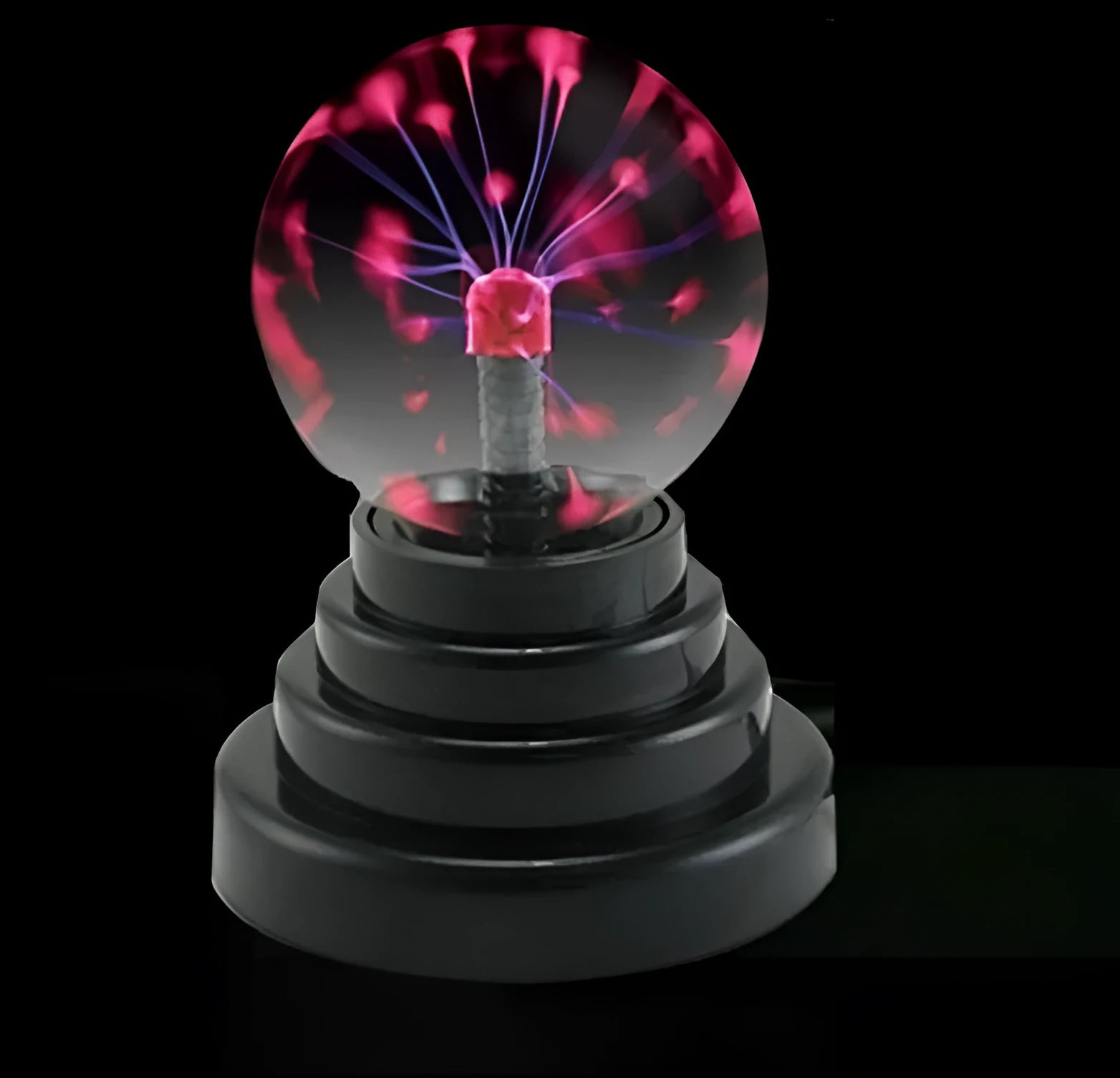 Anti-radiation magic ball light with colourful glow, 7.62cm glass sphere and ABS base on a desk
