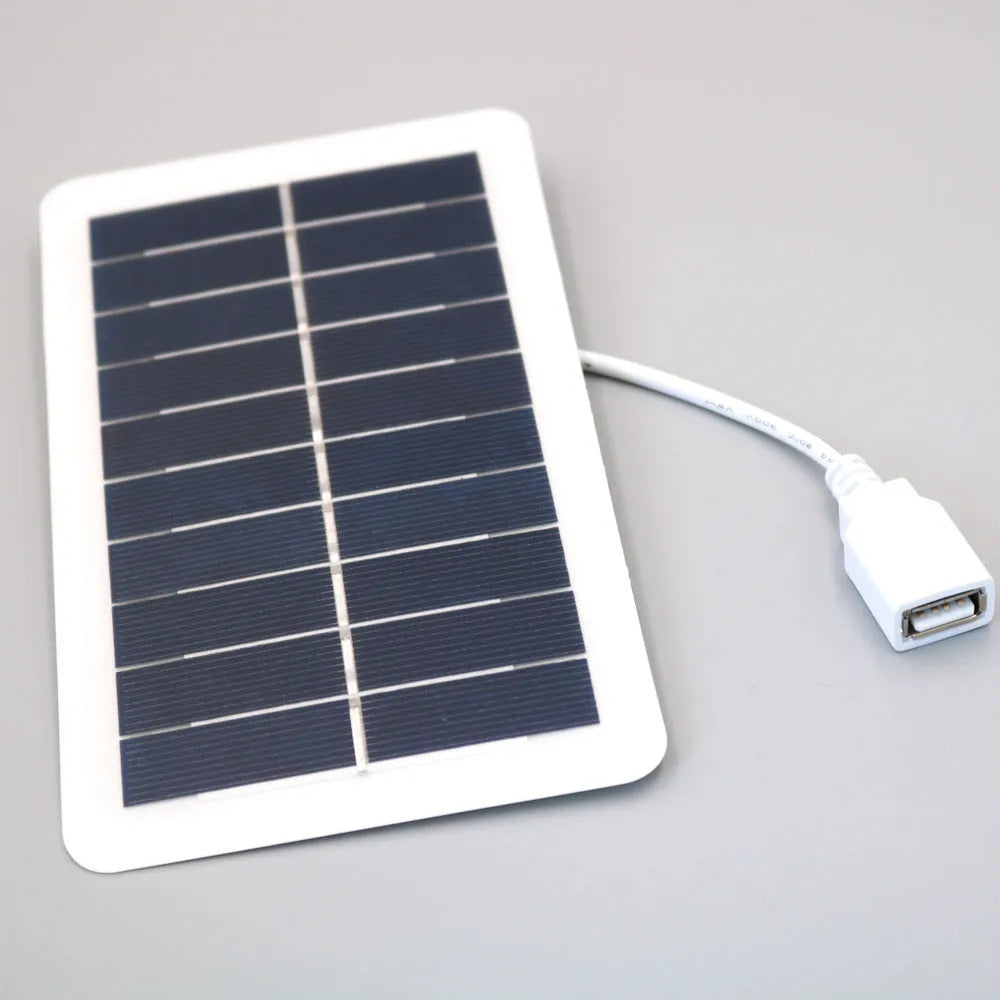 Black portable solar panel mobile phone charger with USB output and PET grinding treatment
