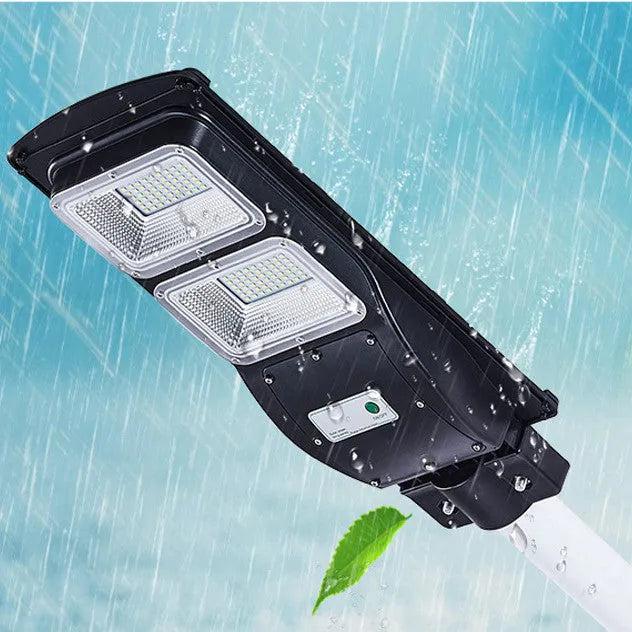 Integrated solar street light with solar panel, 60W LED light and remote control for outdoor installation