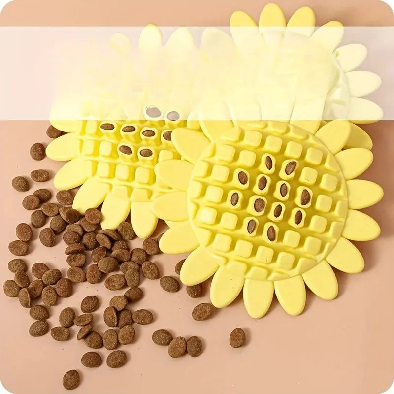 Yellow rubber sunflower dog chew toy on a surface, non toxic and BPA free for puppy teething