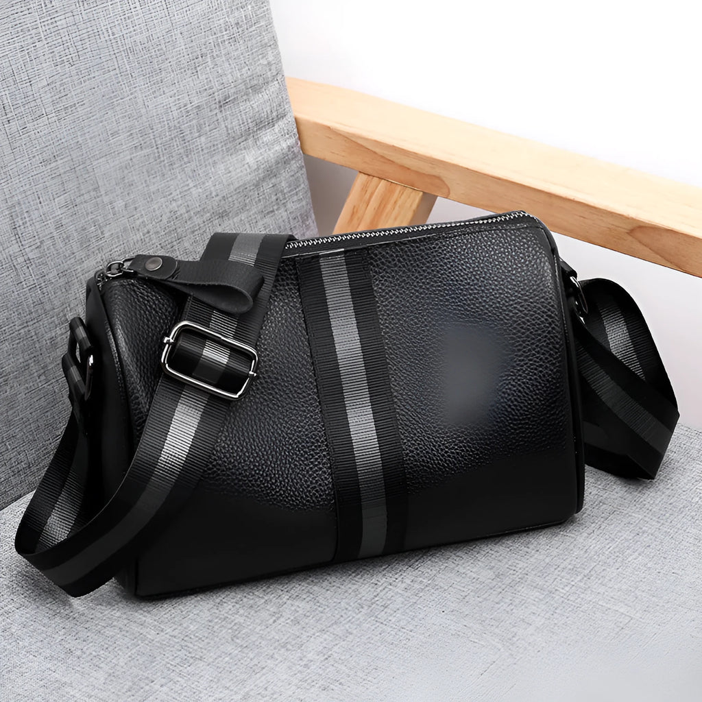 Black genuine leather one-shoulder crossbody bag with large capacity.