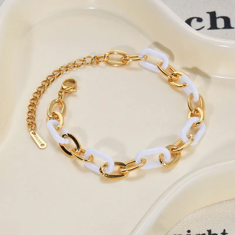 Women's stainless steel resin bracelet with double layered loving heart design in electroplated finish