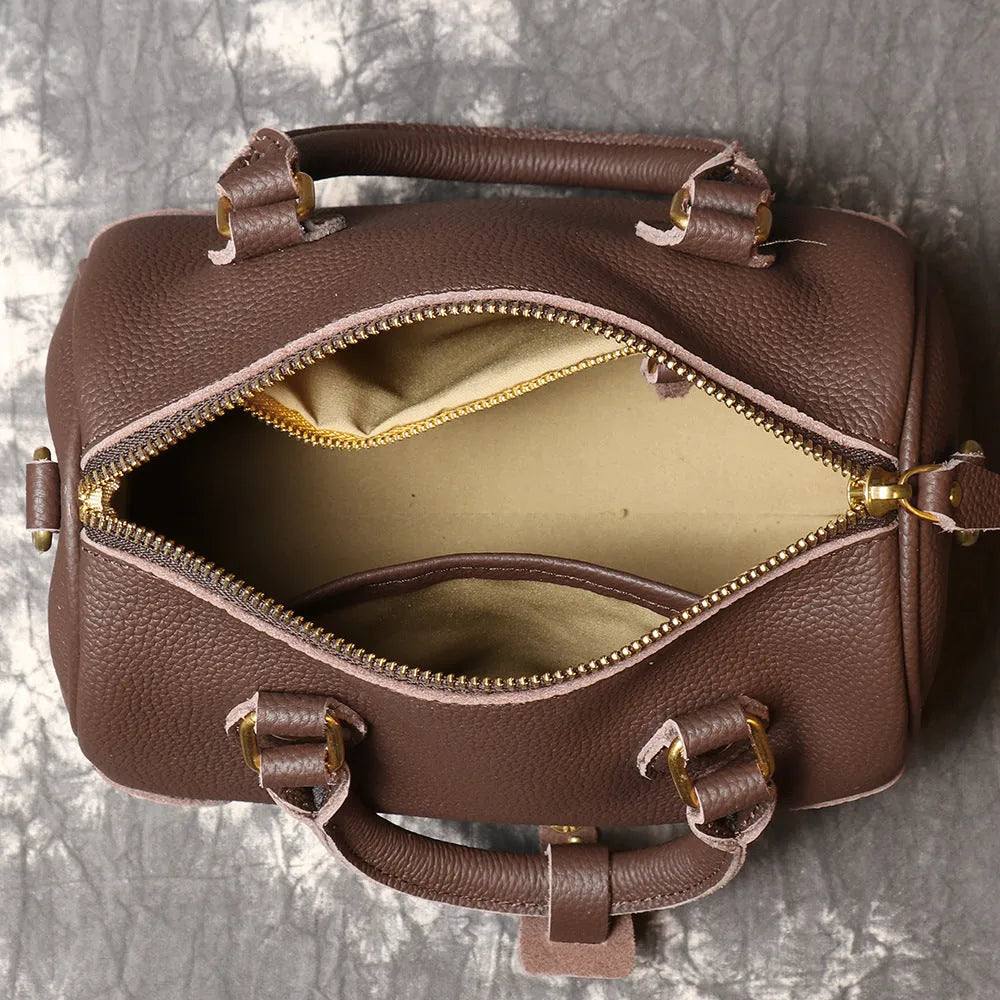 New handmade first layer cowhide Boston bag in brown yellow with sewing thread detailing, single shoulder strap, and open outer pocket