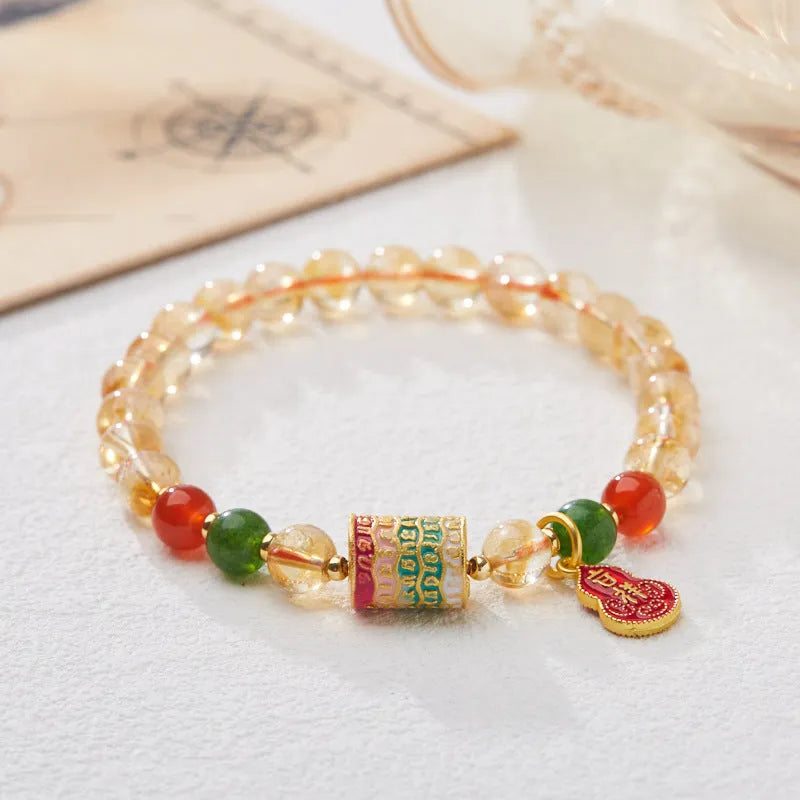 Hand-woven citrine five sutra bracelet with 6mm crystals in geometric braided pattern