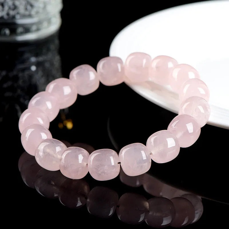 Pink crystal barrel bead bracelet with 11x12mm geometric beads and grinding treatment