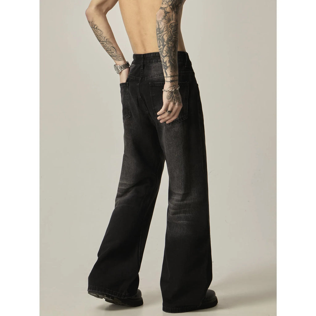 Men's black loose straight jeans with retro styling and zipper fly