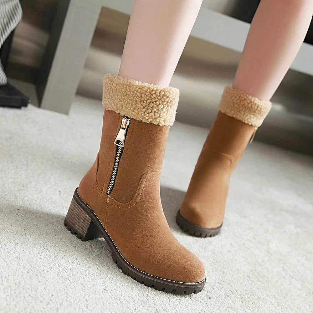 Snow boots with plush lining and rubber sole in black, grey, green, or orange.