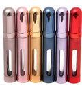 Slim 12ml aluminium travel perfume bottle with glass liner in six colour options.