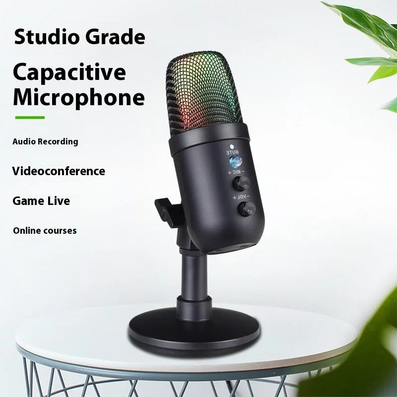 Black USB microphone with RGB lighting on a desktop for live karaoke and recording