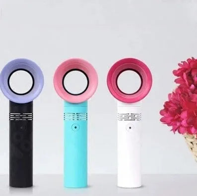 Portable bladeless fan in white with USB charging cable, base, and three speed settings