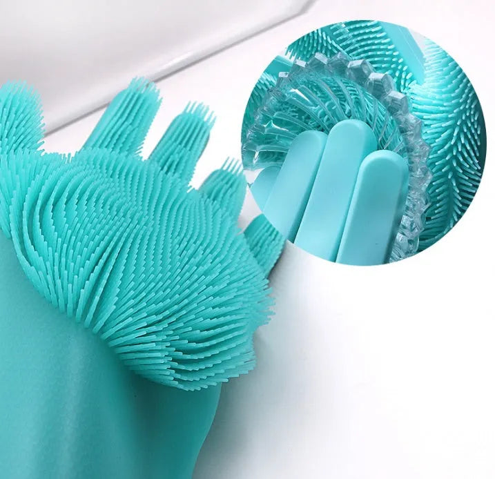Silicone heat-resistant cleaning brush scrubbing gloves in blue, 357x165mm, on a kitchen counter