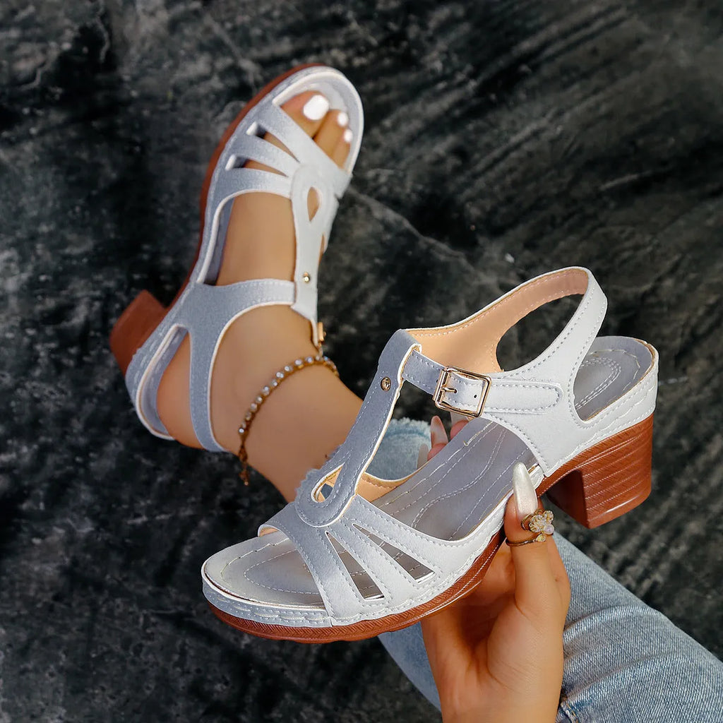 Women's black peep toe wedge platform sandals with a silver buckle fastener