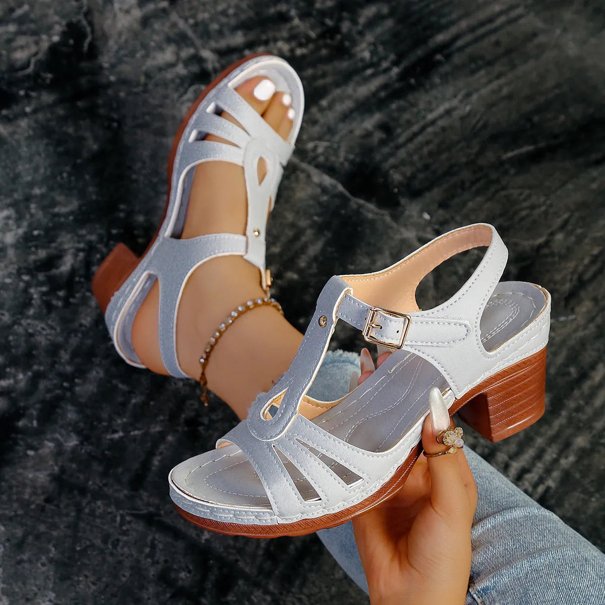 Women's black peep toe wedge platform sandals with a silver buckle fastener