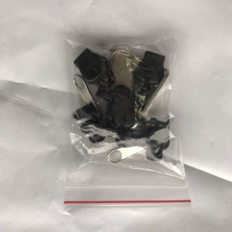 12-piece zipper head repair kit in black, black grey, and coffee with plastic and metal construction