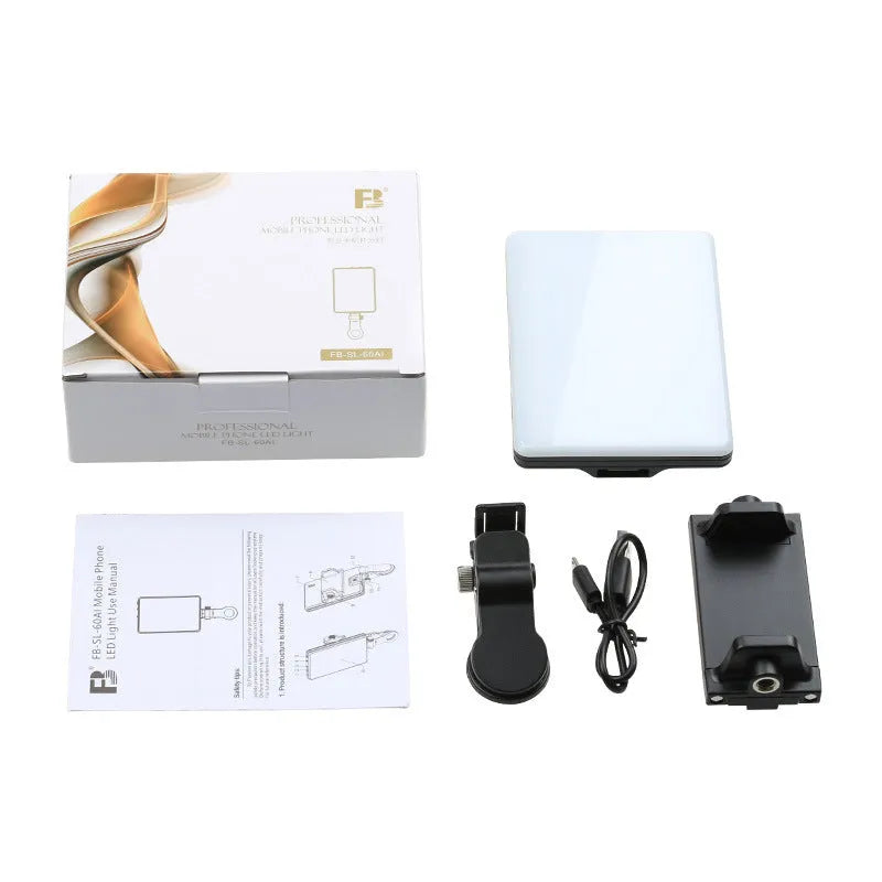 White portable LED mobile phone fill light with clip attached to a phone showing two-colour temperature modes and 250 Lux brightness