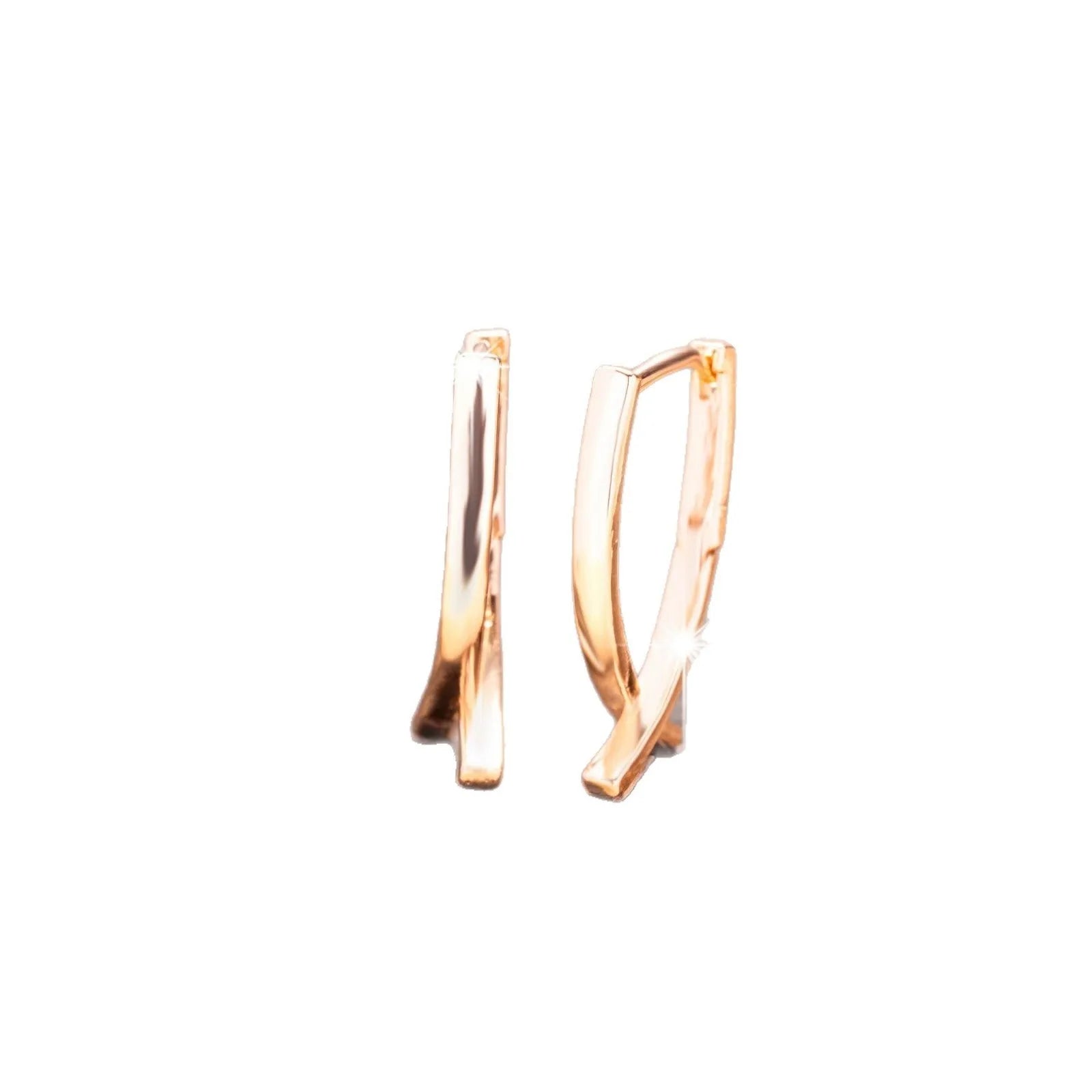 Rose gold plated copper cross earrings with symmetrical design and post fittings