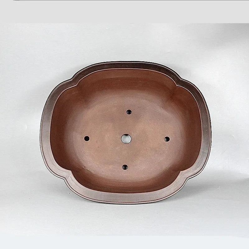 Handmade antique crabapple shaped purple clay flowerpot measuring 74x61x23cm