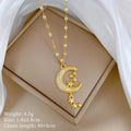 Geometric moon pendant necklace with tassel detailing in stainless steel and copper construction