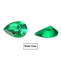 Cultivated emerald green treasure shaped colored gemstone round cut polished loose stone on white background