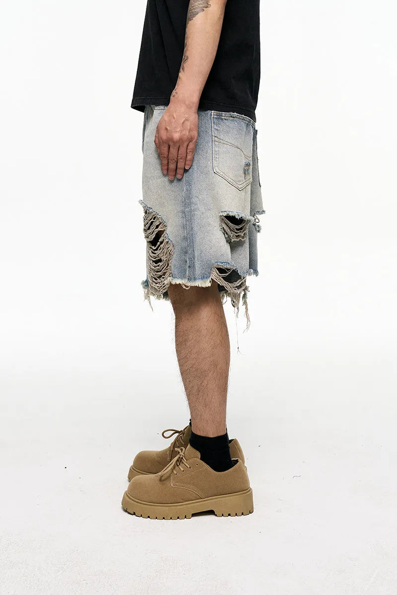 Men's light blue retro washed baggy denim shorts with wide leg cut and zipper fly