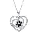 Original design women's necklace with copper dog paw print pendant on a cross chain.