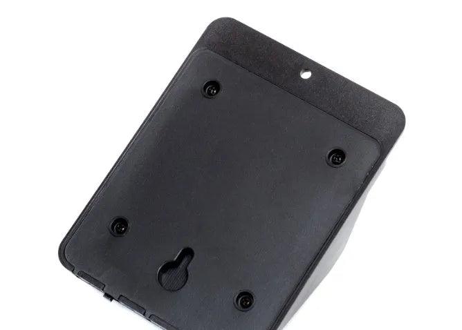 Grey outdoor solar security light with four LED bulbs and a motion sensor mounted on a wall