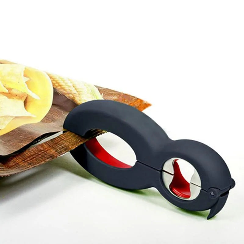 6-in-1 multifunctional can opener and bottle opener in grey on a kitchen worktop showing dual ring design