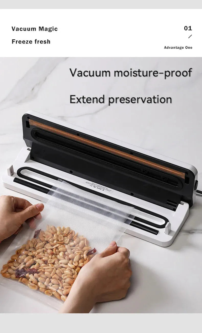Black compact automatic vacuum sealer machine for food preservation on a kitchen counter.