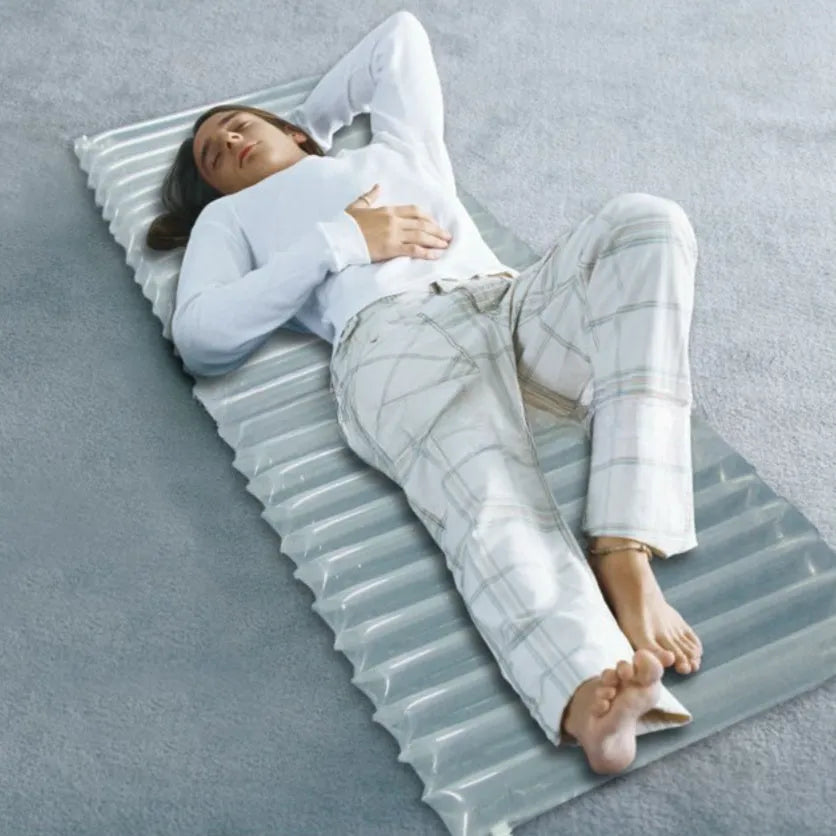 Outdoor camping airbed 200x60x5cm transparent inflatable sleeping mat on green grass
