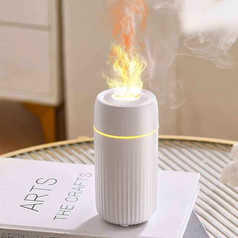 Car flame simulation aroma diffuser with automatic sprayer in black or white, showing dimensions 70×70×143mm