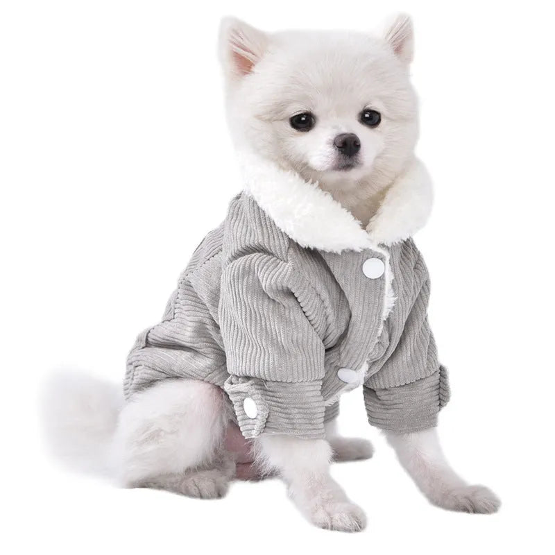 Lambswool fleece-lined dog vest in grey or pink, shown on a pet, for autumn and winter warmth.
