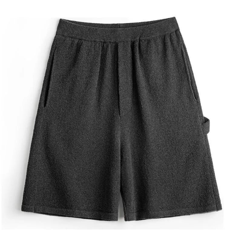 Cement grey American-style sport shorts with loose profile and straight-cut design for athletic wear