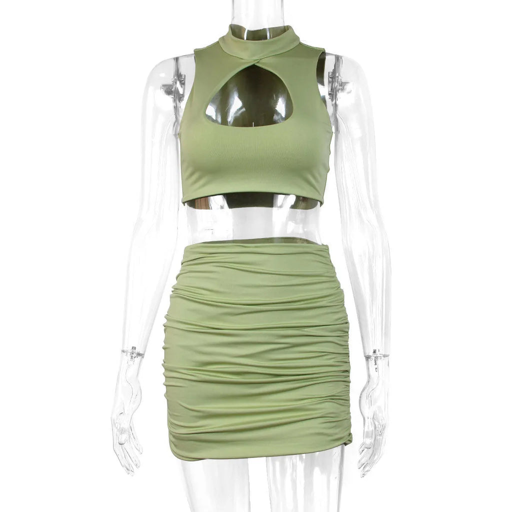 Women's light purple hollow vest and split skirt two-piece set shown on model