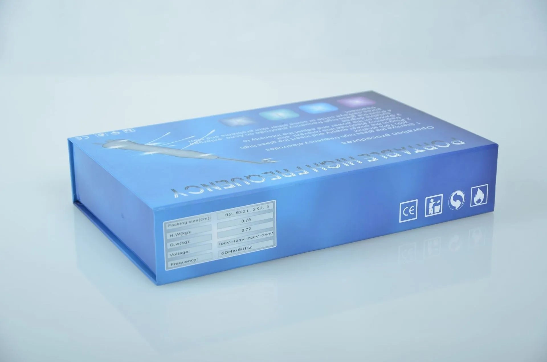 White high-frequency electrotherapy comb with four glass electrodes in packaging
